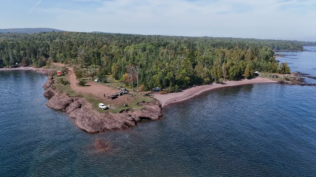 An aerial photograph of tree lined river. Wisco Aerial & Ground Services provides aerial photography and videography to all of Southern Wisconsin.