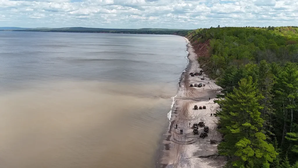 An aerial photograph of tree lined river. Wisco Aerial & Ground Services provides aerial photography and videography to all of Southern Wisconsin.