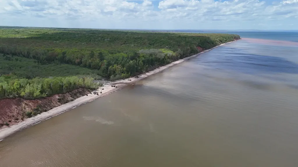 An aerial photograph of tree lined river. Wisco Aerial & Ground Services provides aerial photography and videography to all of Southern Wisconsin.